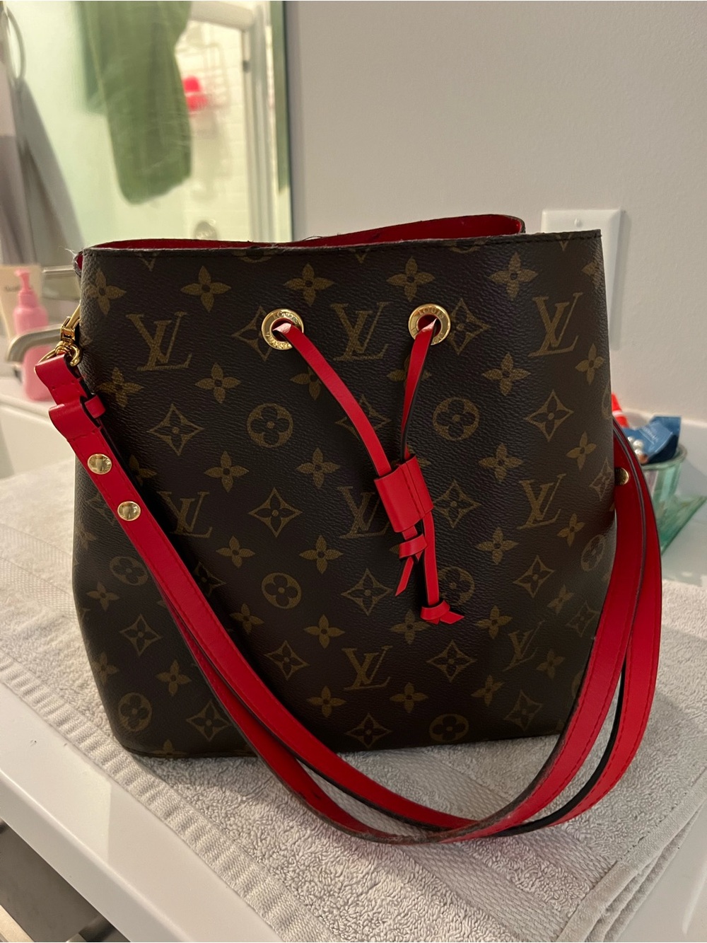 Louis Vuitton Monogram Bucket Bag with Red Trim